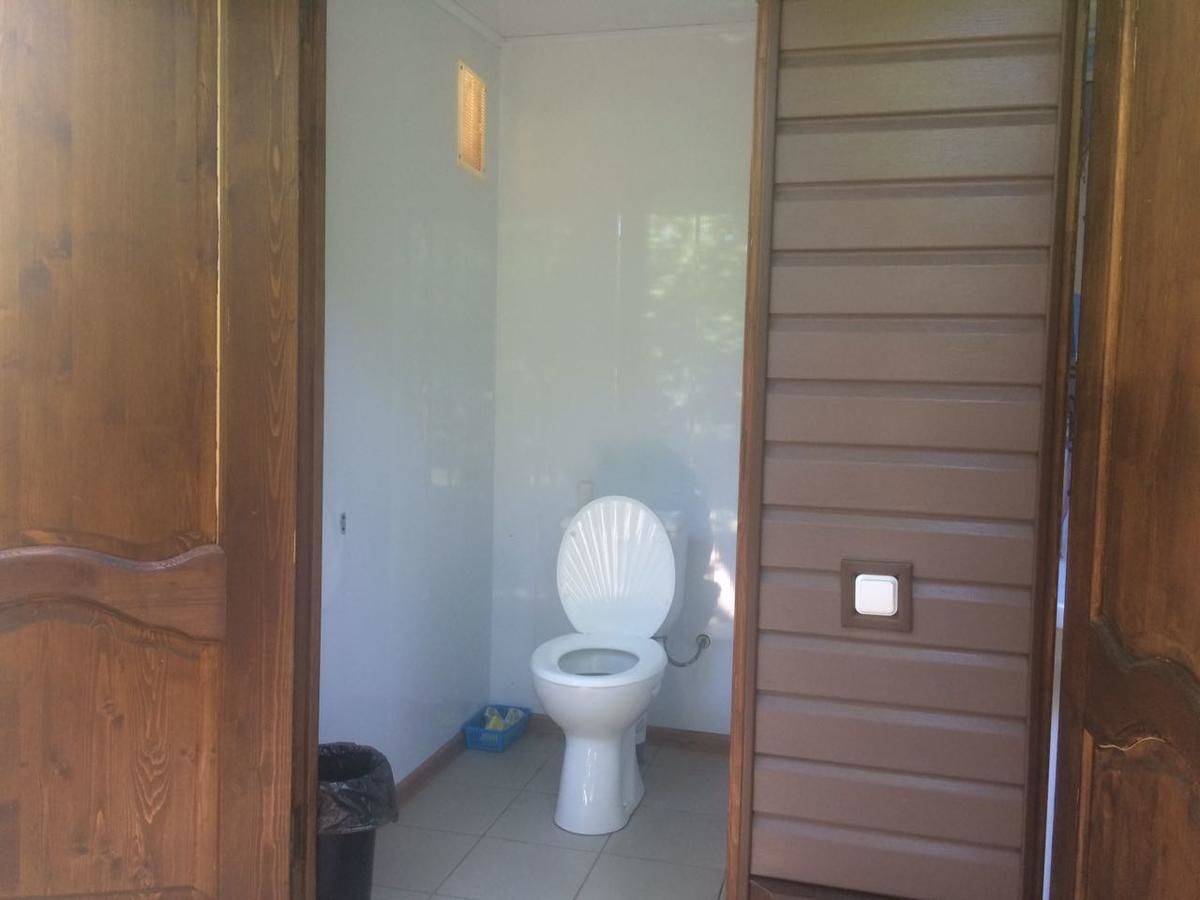 Фотографии номера Двухместный номер с 2 отдельными кроватями, вид на сад в Гостевом доме Гостевой дом Южная Пальмира Пицунда